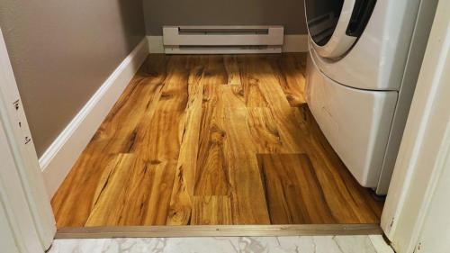 Vinyl Floor and Baseboard Installation